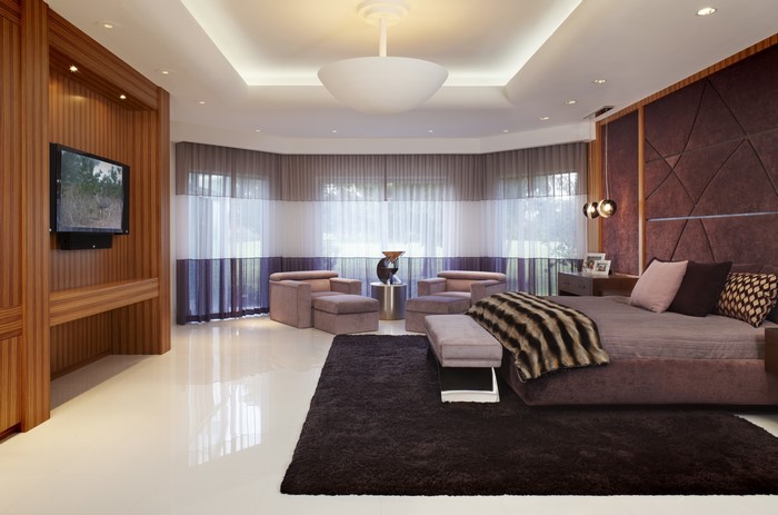Modern Bedroom with Large Bed and Sitting Area