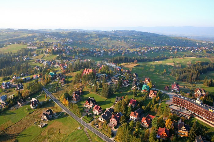 Aerial view of houses in a rural landscape in Poland