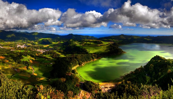 Green lake and rolling hills in Azores, Portugal