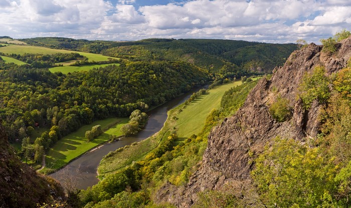 River valley with forests and rocky cliffs in Karlova Ves, Czech Republic