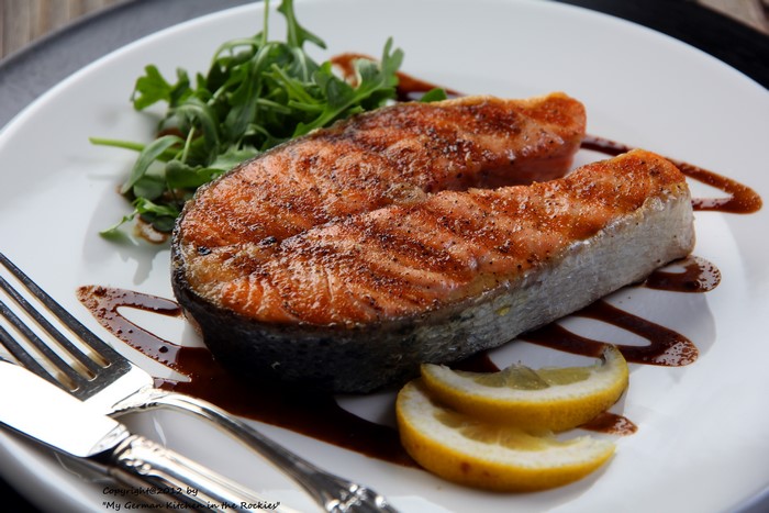 Grilled Salmon Steak with Arugula and Lemon