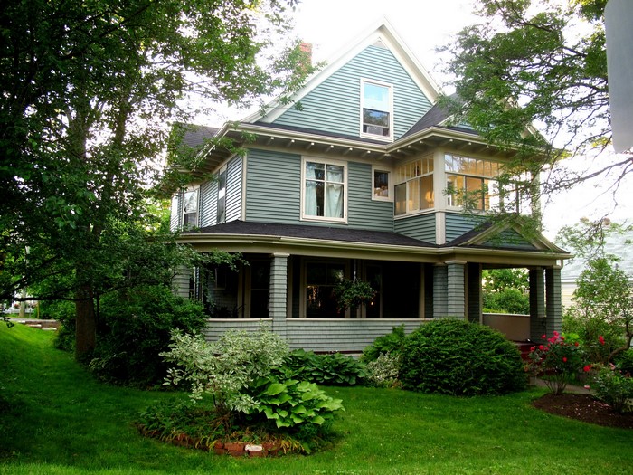 Green house with a large lawn in New Scotland, Canada