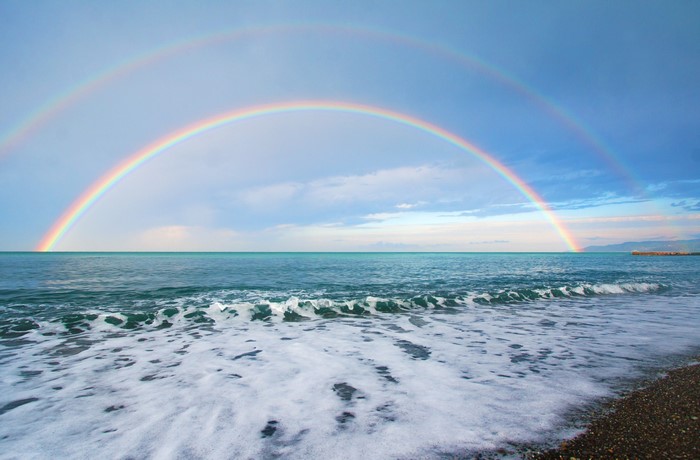 Double rainbow over the sea and coast