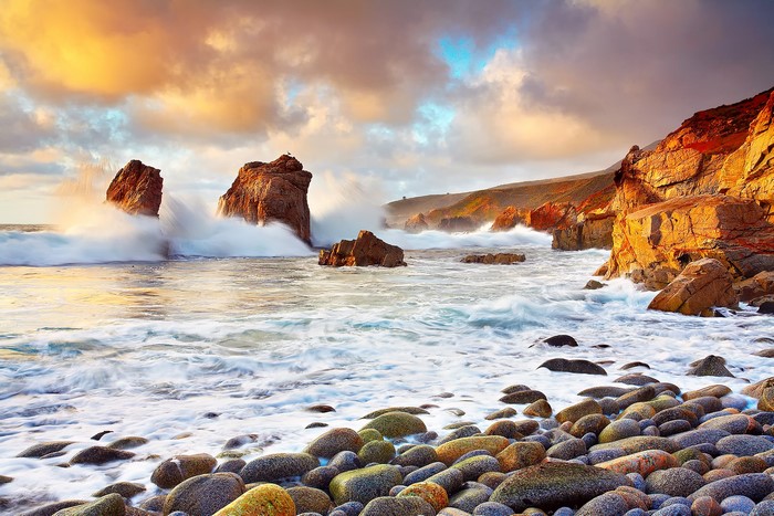Waves crashing on rocky coast of California