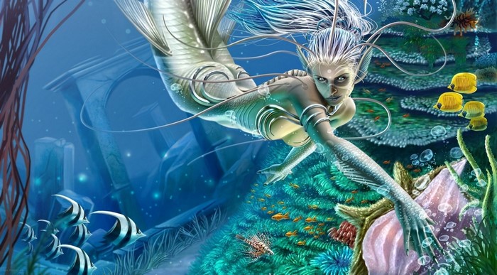 Mermaid swimming in a colorful underwater world with fish