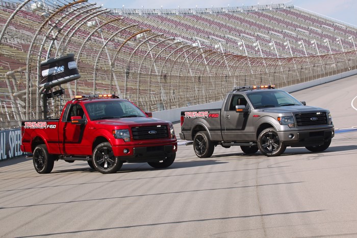2014 Ford F-150 Tremor trucks on a racetrack