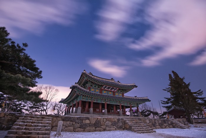 Korean Pagoda at Night with Clouds and Stars