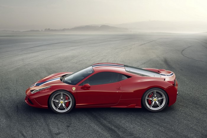 Red 2013 Ferrari 458 Italia Speciale on a track