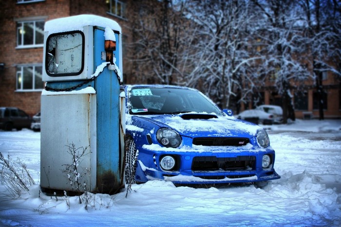 Blue Subaru Impreza WRX STI in Snow