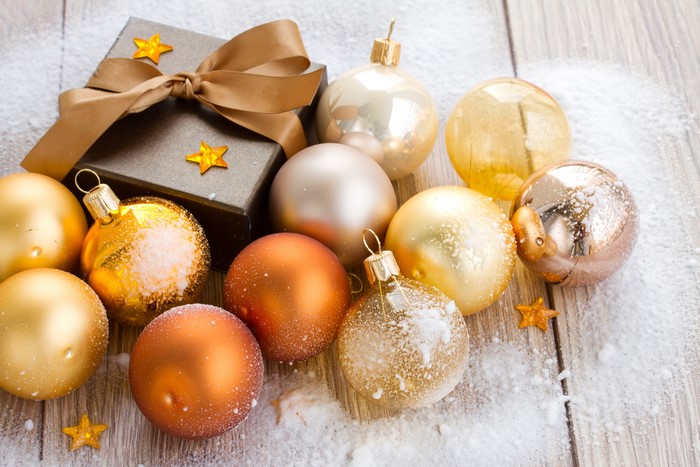 Christmas ornaments and gift box with snow