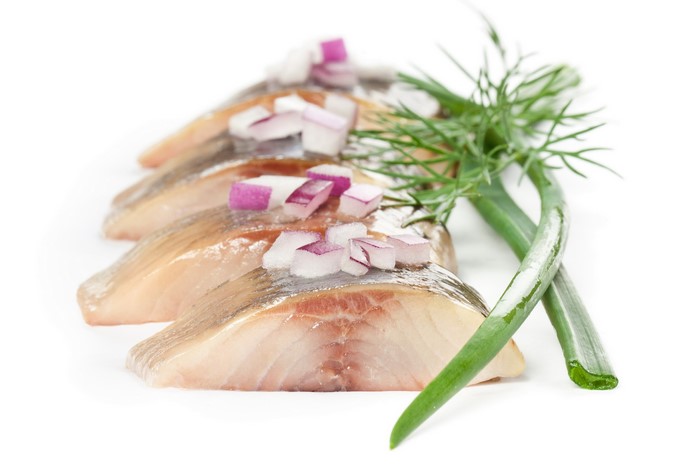 Herring fillets with red onion and dill