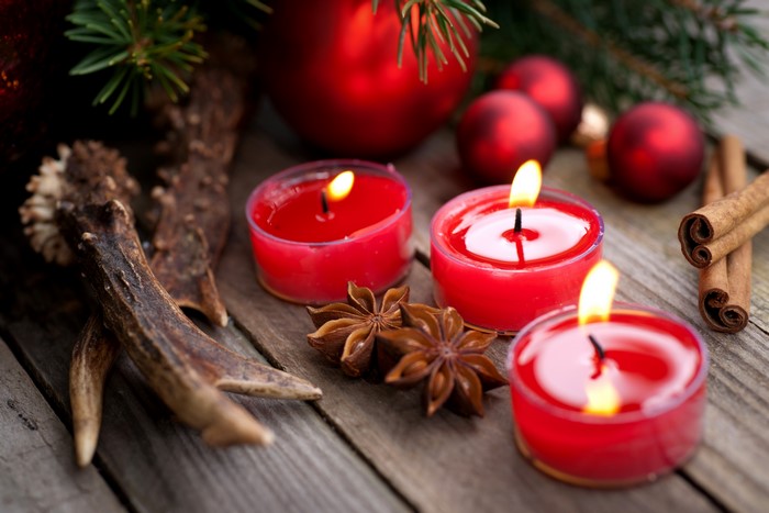 Christmas candles with pine and cinnamon