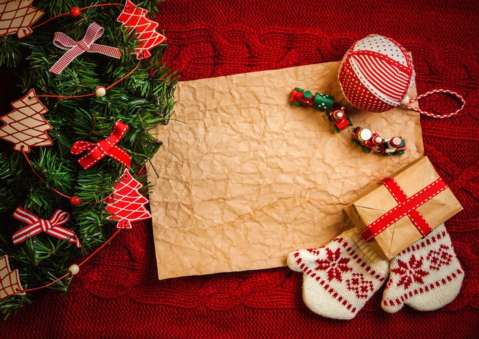 Christmas tree decorations, gift, and parchment paper