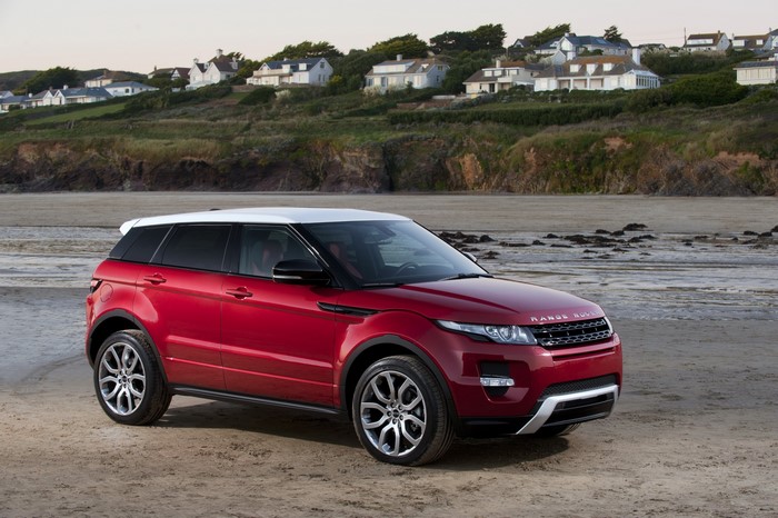 Red Range Rover Evoque on a Beach