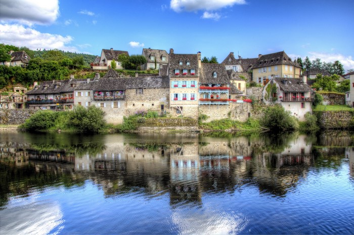 Houses on the riverbank in Argentat, France