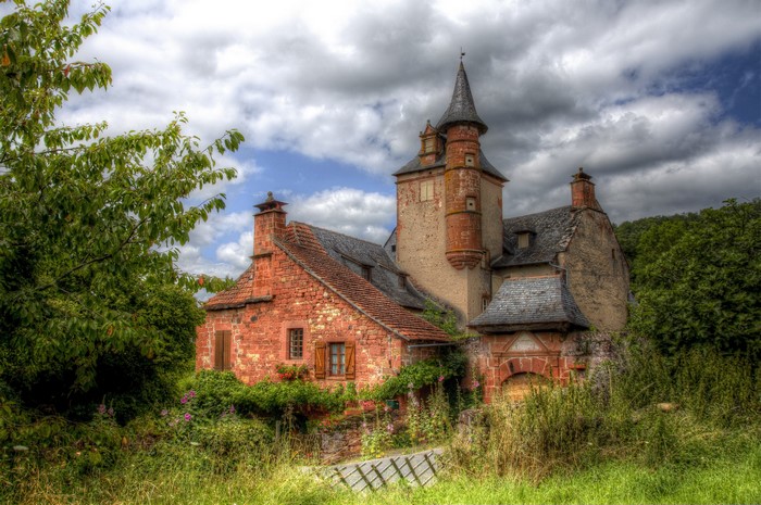Brick house with tower in Collonges-la-Rouge, France