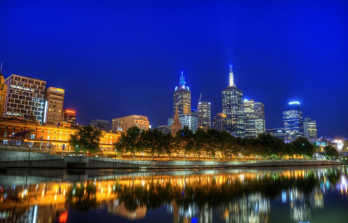 Melbourne skyline at night with Yarra River reflection