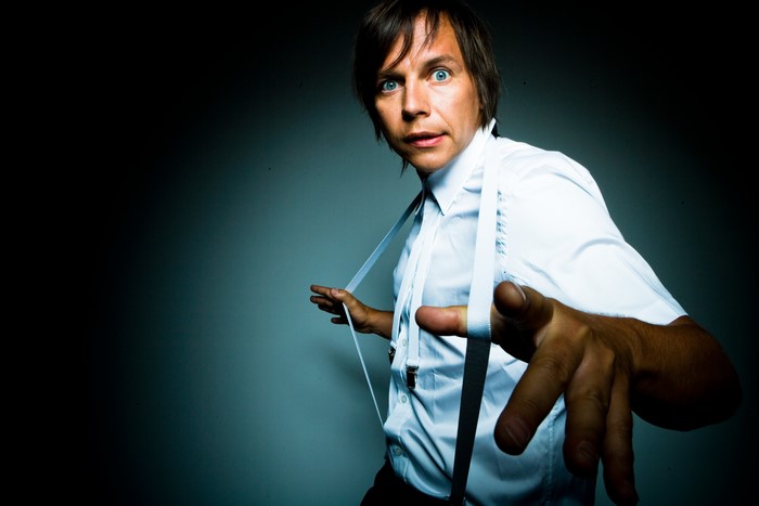 Ilya Lagutenko from Mumiy Troll wearing a formal shirt and suspenders