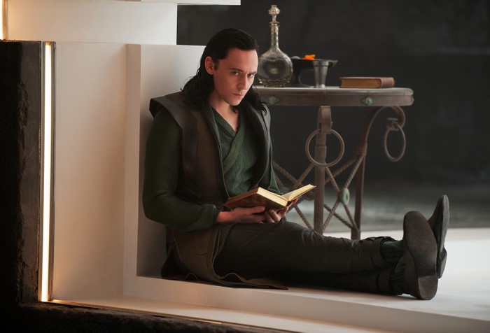 Loki from Thor: The Dark World reading a book