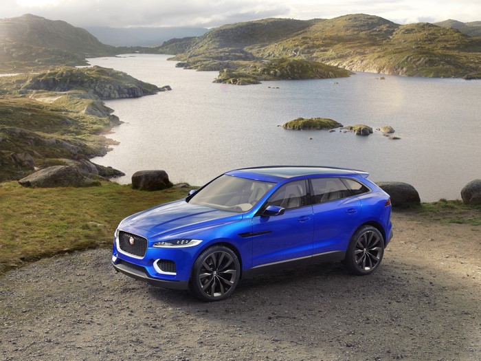 Blue 2013 Jaguar C-X17 SUV in a Landscape