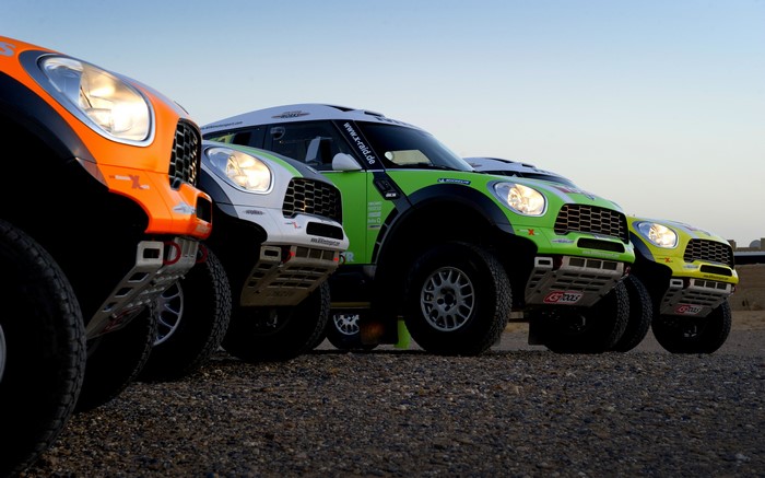 Four Mini Cooper Rally Cars Lined Up