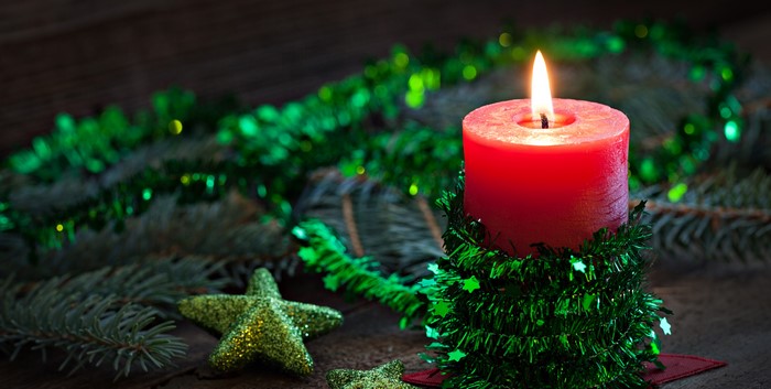 Red Candle with Christmas Decorations