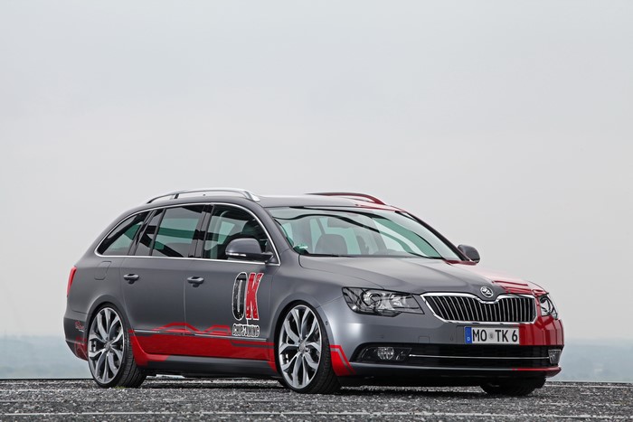 Grey Skoda Superb Combi with red accents