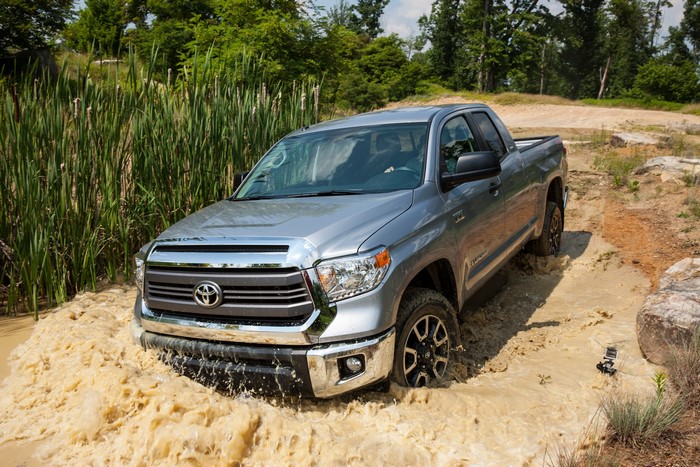 2014 Toyota Tundra SR5 driving through mud