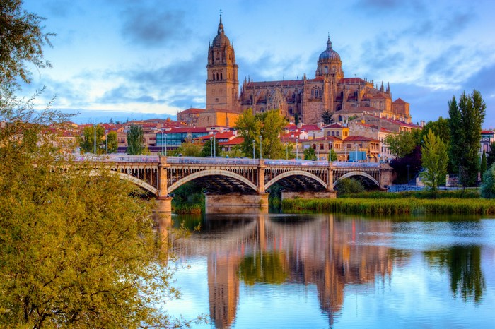Salamanca Cathedral and Puente Romano over Tormes River