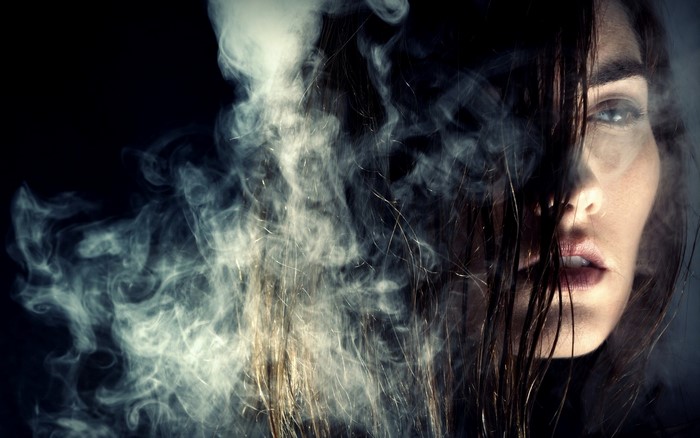Woman with smoke and hair