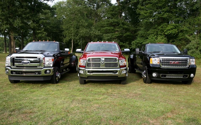 Ford F-450, Ram 3500, and GMC Sierra 3500 trucks