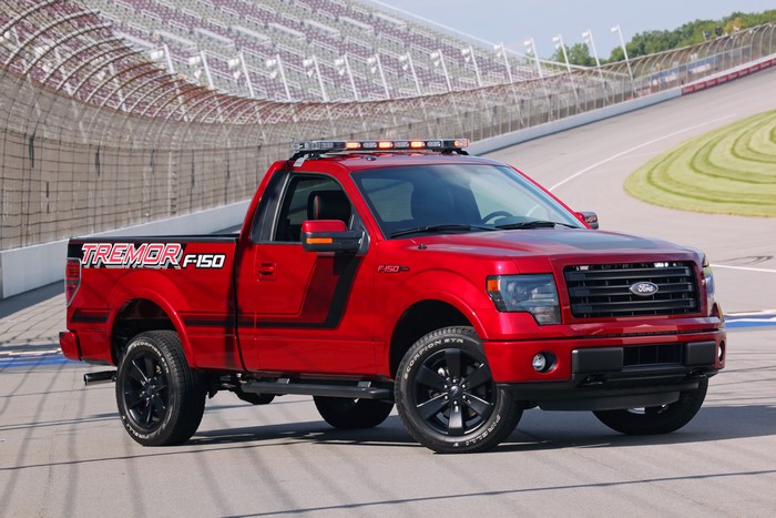 Red 2014 Ford F-150 Tremor on Race Track