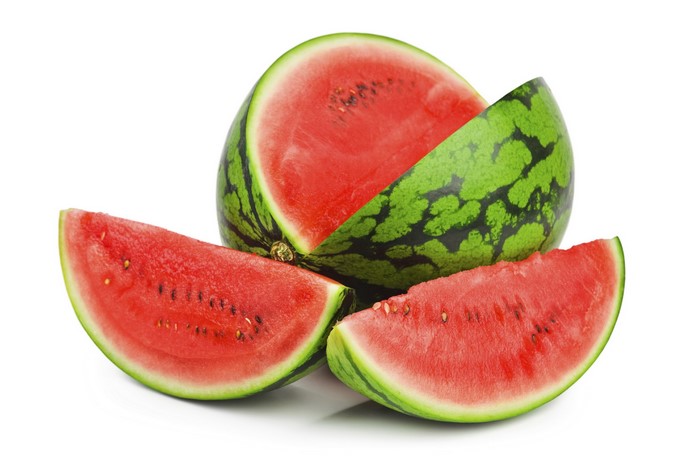 Watermelon slices and a whole watermelon