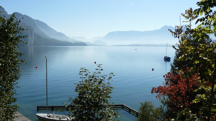 Lake Wolfgangsee with mountains and boats in St Gilgen, Austria