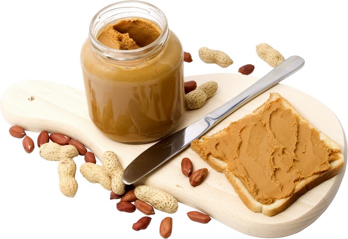 Peanut Butter Sandwich with Peanuts and Knife