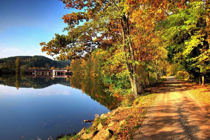 Autumn road by a lake in Bavaria, Germany