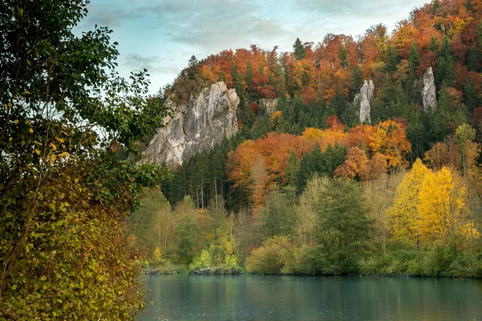 Autumn forest with river and rock formations in Bavaria, Germany