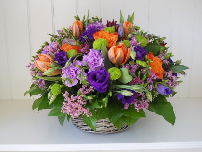 Colorful flower arrangement in a basket