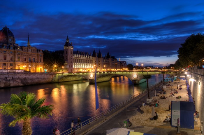 Paris at night with the Seine River and bridges