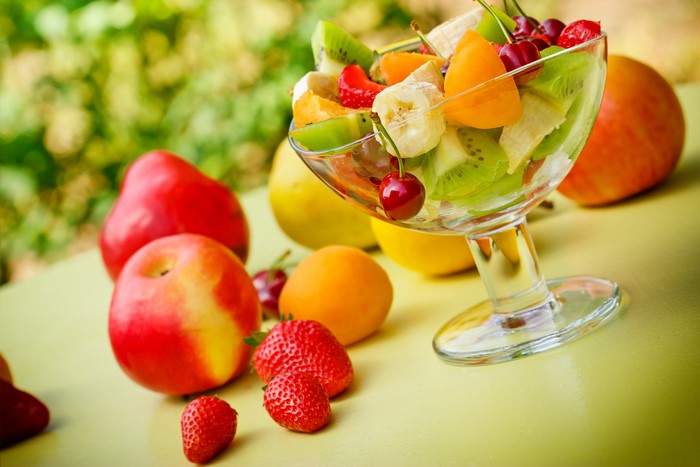 Fruit salad with strawberries, kiwi, and cherries