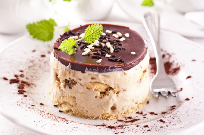 Chocolate layered dessert with mint and sprinkles