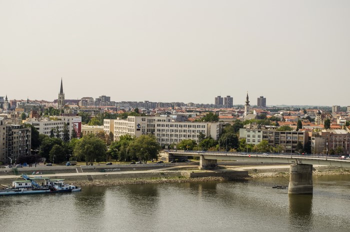 Cityscape of Novi Sad with a bridge over the Danube River