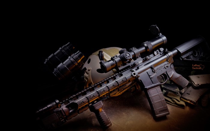 AR-15 rifle with scope and tactical gear
