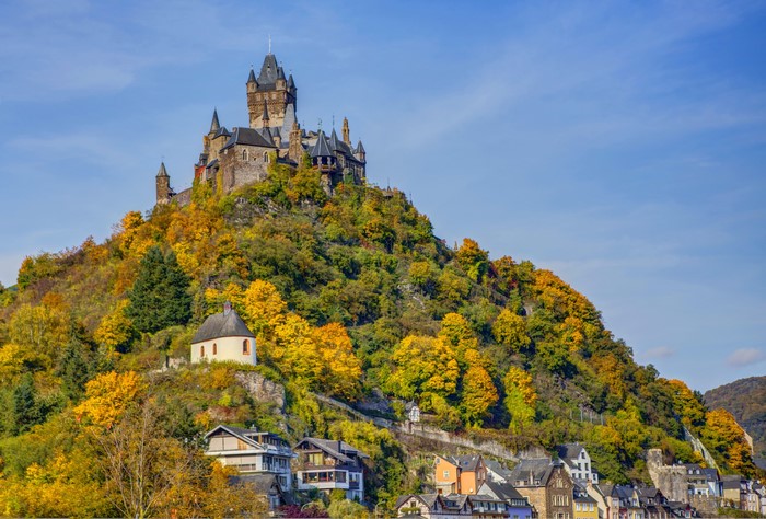 Reichsburg Cochem castle in Germany during autumn