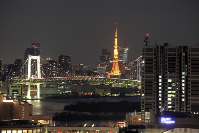 Tokyo night cityscape with Rainbow Bridge and Tokyo Tower