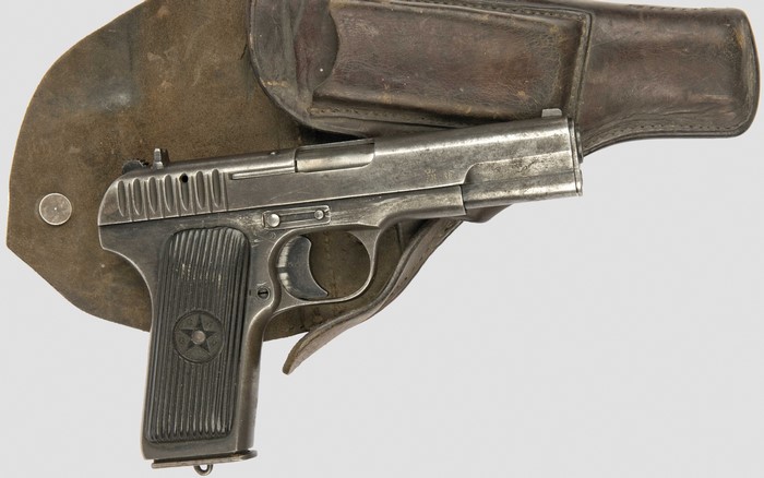 Tokarev TT-33 pistol in a leather holster