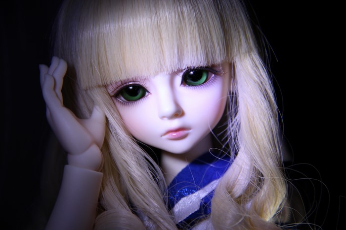 Doll with blonde hair and green eyes
