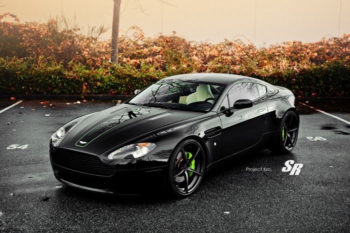 Black Aston Martin Vantage in a Parking Lot