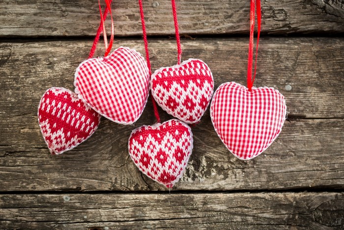 Valentine's Day Heart Ornaments on Wooden Background