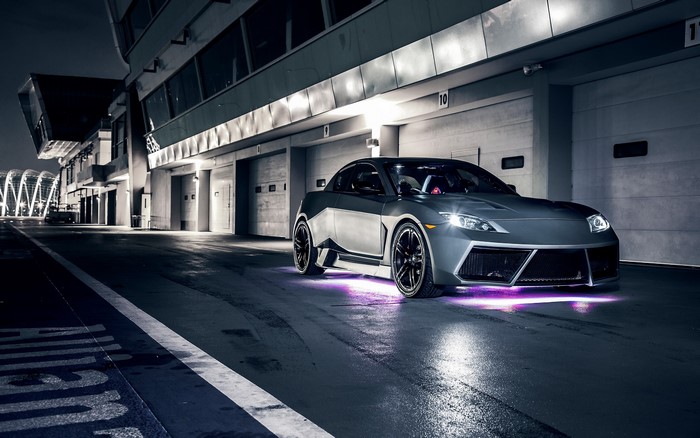 Mazda RX-8 with purple underglow at night